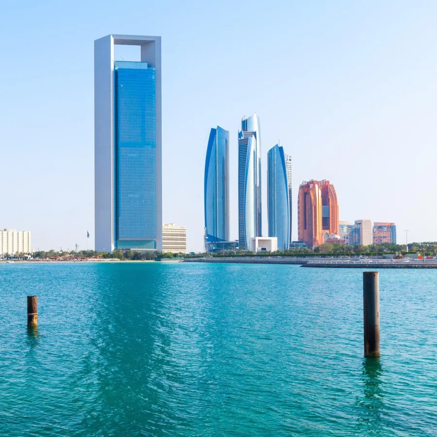 Abu Dhabi skyline with the ADNOC tower — symbol of a UAE freed from OPEC's production ceiling
