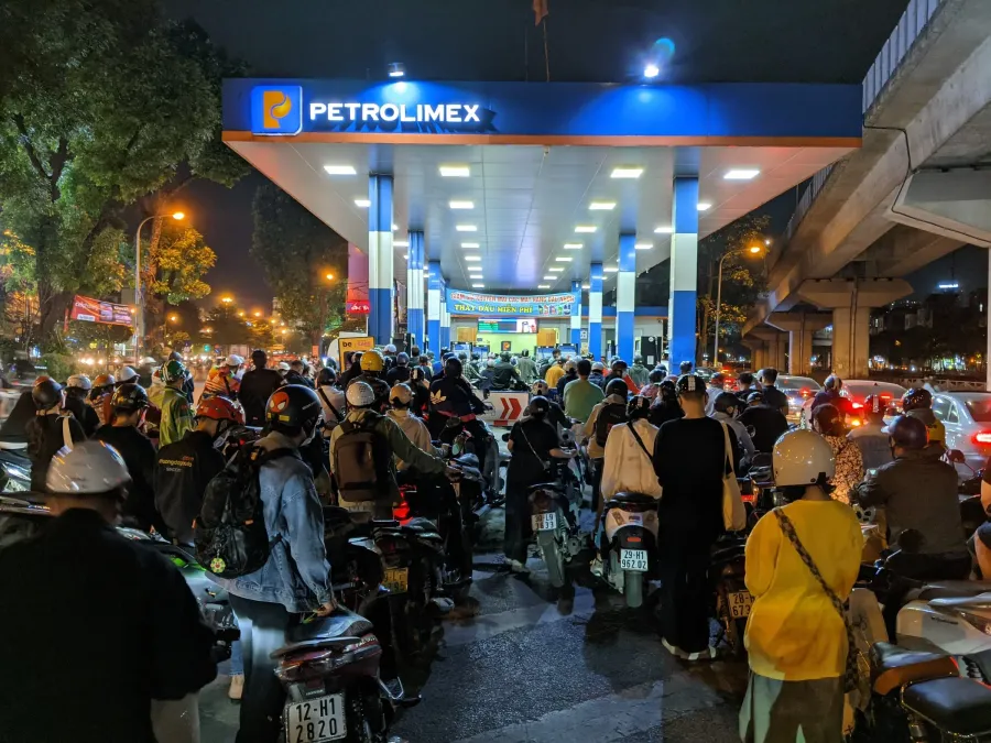 Consumers refueling at a Petrolimex station