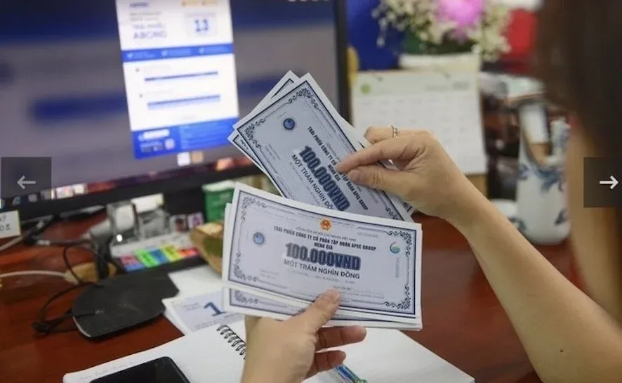 An investor reviewing corporate bond certificates