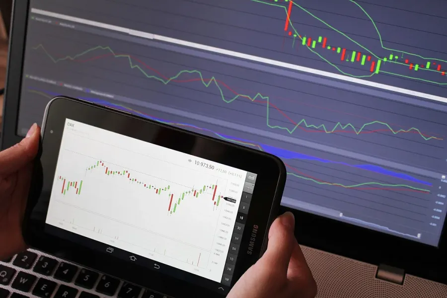 Investors tracking global market screens