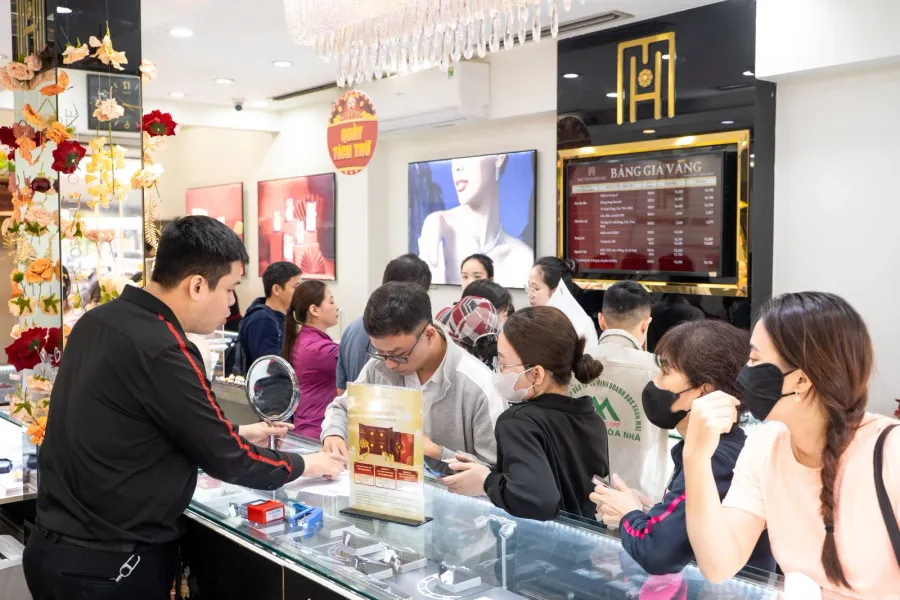 Customers trading gold at a jewelry store