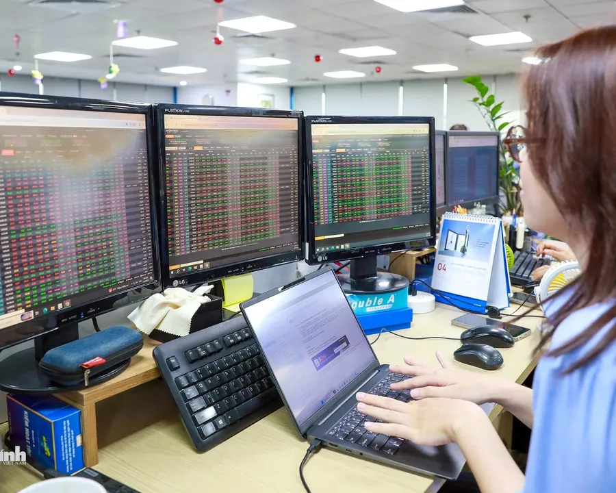 Investor watching trading screens