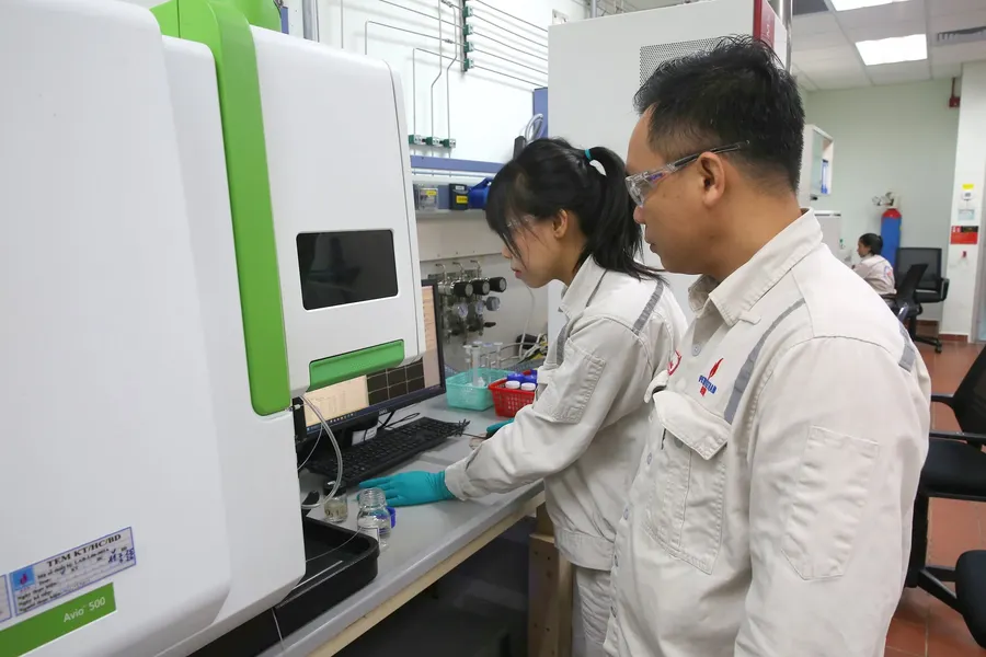 Technicians testing fuel quality