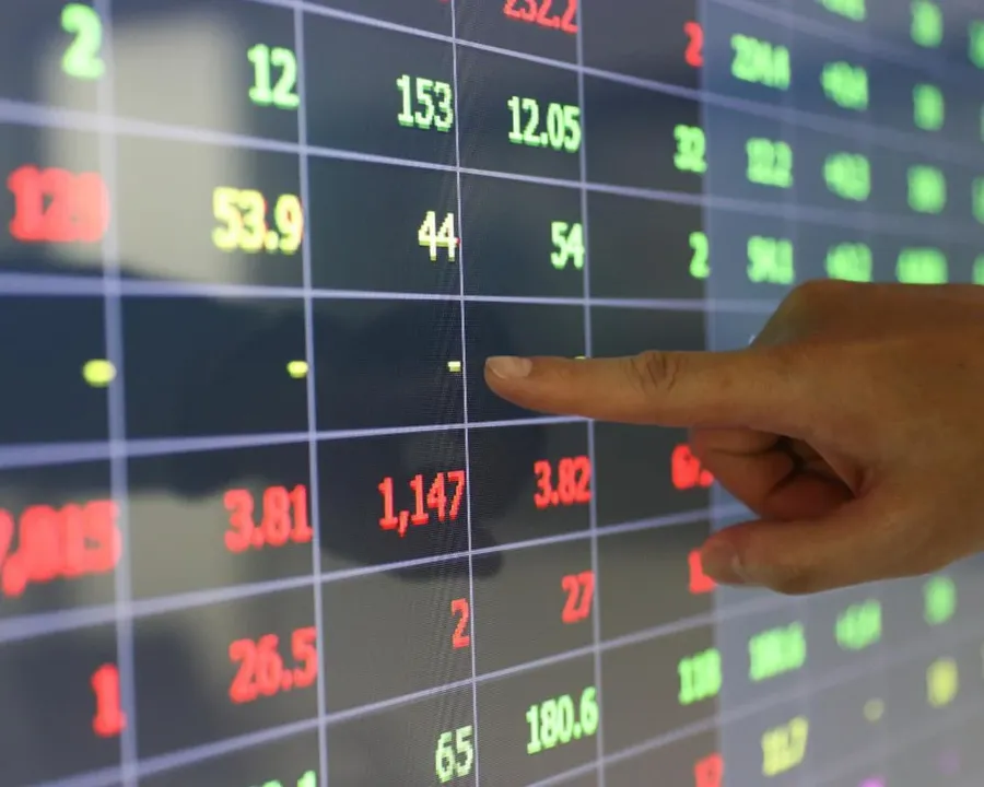Stock ticker board showing declining prices