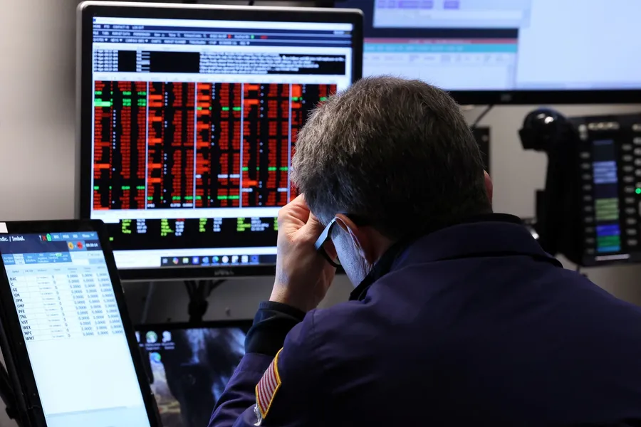 A trader on the New York Stock Exchange floor during a down session