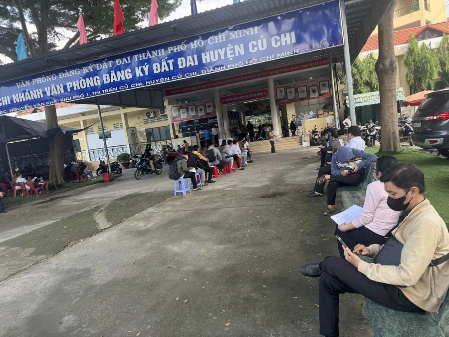 Residents lining up at a Land Registration Office