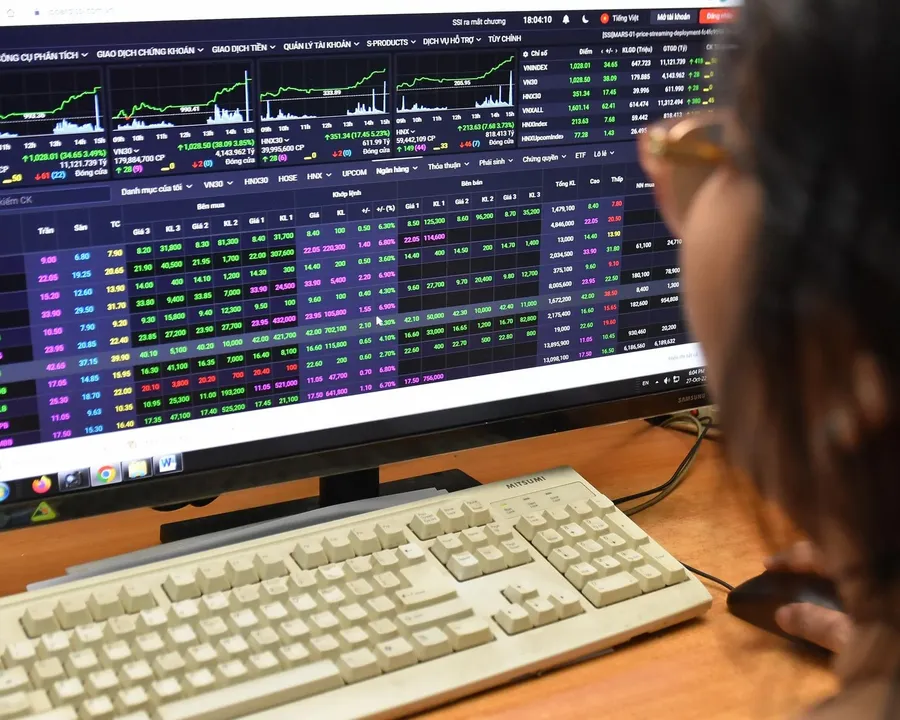 An investor watching a stock trading screen