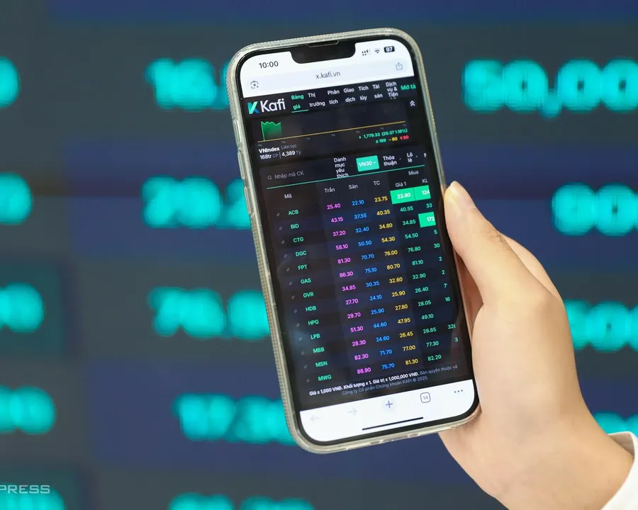 Individual investor checking stock prices on a phone