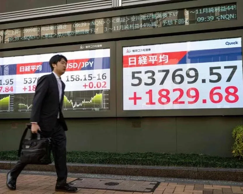 Stock ticker board in Tokyo displaying the Nikkei 225