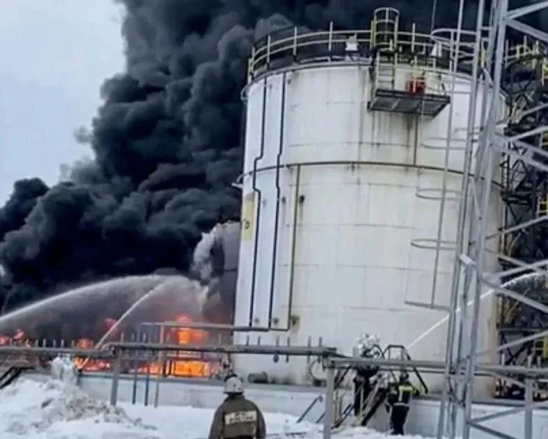 A refinery on fire after a drone strike