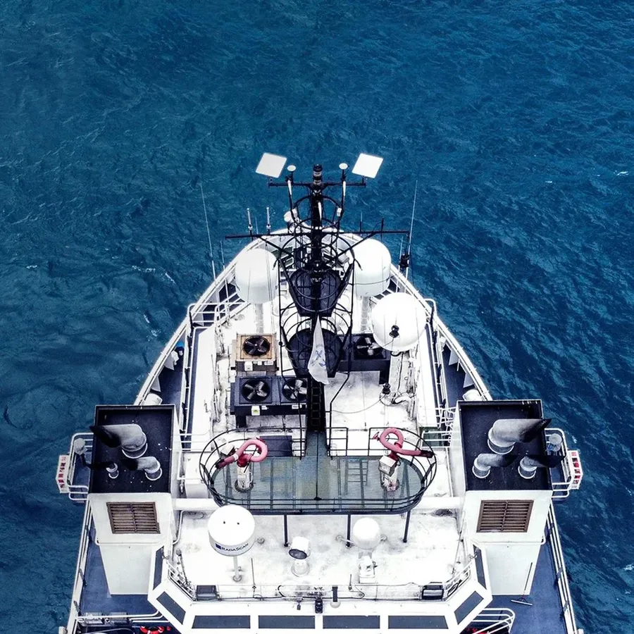 Aerial view of a ship fitted with satellite internet antennas