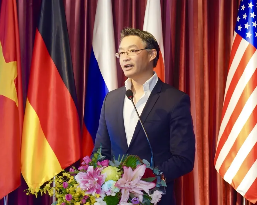 Mr. Philipp Roesler speaking at an event in Vietnam